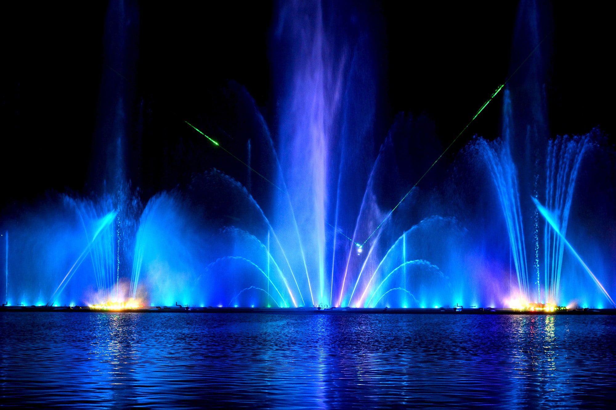 Laser musical fountain Roshen in Ukraine, in Vinnitsa. Night light laser show. Glowing fountains. Photo: Shutterstock